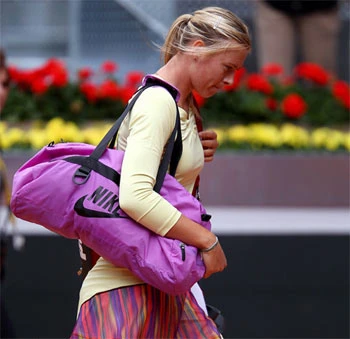 Henin và Sharapova sớm tạm biệt Madrid ảnh 1