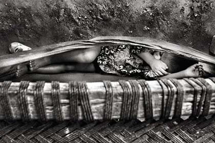 Những bức ảnh khó quên về trẻ em năm 2011 ảnh 4