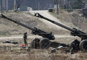 Mỹ, Nhật, Hàn nâng mức báo động ảnh 1