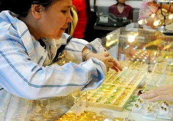 Giá vàng bất ngờ nhảy vọt, vượt xa 27 triệu đồng ảnh 1