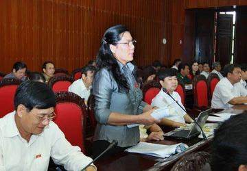 Sửa đổi Bộ luật Lao động : Vợ sinh, chồng được nghỉ? ảnh 1