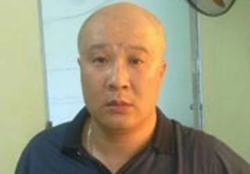 Bắt đối tượng giết 4 người tại Trung Quốc, trốn truy nã sang Việt Nam ảnh 1