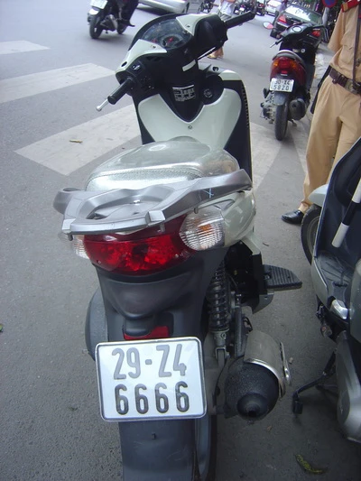 Báo cáo Bộ Công an vụ lái xe biển 6666 nhổ bọt vào mặt cảnh sát giao thông ảnh 1