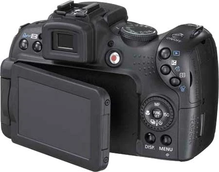 Canon Powershot SX1 IS màn hình 2,8 inch, lật cạnh và xoay 180 độ. Ảnh: Digitalcameratracker. Canon Powershot SX1 IS màn hình 2,8 inch, lật cạnh và xoay 180 độ. Ảnh: Digitalcameratracker.