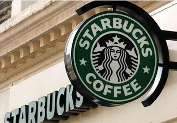 Starbucks lần đầu trả thuế ở Anh sau 5 năm ảnh 1