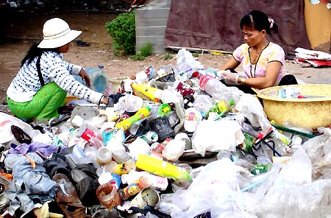 Lăn lộn mưu sinh bên bãi rác ở Sài Gòn ảnh 1 Lăn lộn mưu sinh bên bãi rác ở Sài Gòn ảnh 1