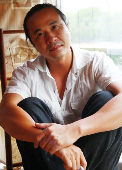 Hành trình âm nhạc của "Gã quê mùa tài hoa" Lê Minh Sơn ảnh 1