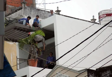 Phát hiện xác phụ hồ trên sân thượng ảnh 1