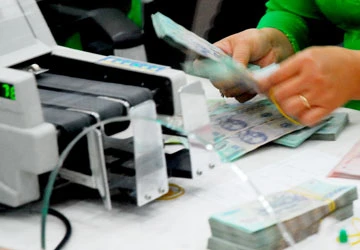 Sở hữu chéo không thể dùng để tái cấu trúc NH ảnh 1