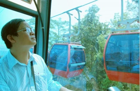 Ngắm hồ Thác Mơ từ cáp treo núi Bà Rá ảnh 6 Ngắm hồ Thác Mơ từ cáp treo núi Bà Rá ảnh 6