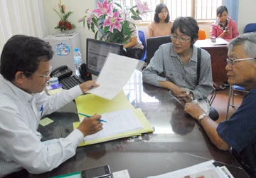 Công chứng mua bán nhà dự án: Mỗi nơi yêu cầu một phách ảnh 1