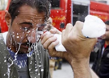 Những dụng cụ tự vệ sáng tạo của người biểu tình Cairo ảnh 5