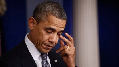 Tin dỏm Obama bị thương, Dow Jones giảm 100 điểm ảnh 1