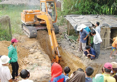 Khai quật mộ tập thể tại địa đạo xã Trung An, huyện Củ Chi ảnh 1 Khai quật mộ tập thể tại địa đạo xã Trung An, huyện Củ Chi ảnh 1