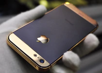 Chế "áo giáp" vàng cho iPhone 5 ảnh 6