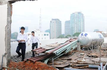 Vụ “cho 4, xây 11 lầu”: 1 người bị sa thải, 5 người bị cảnh cáo, khiển trách ảnh 1 Vụ “cho 4, xây 11 lầu”: 1 người bị sa thải, 5 người bị cảnh cáo, khiển trách ảnh 1