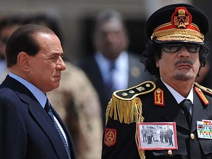 Thời trang "quái" của ông Gaddafi ảnh 11