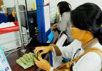 Tập trung xử lý các tổ chức tín dụng yếu kém ảnh 1