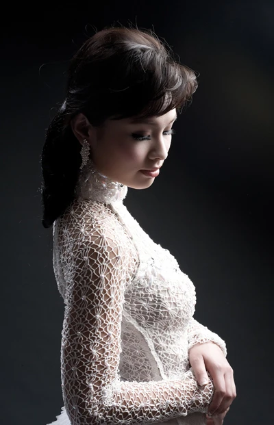 Miss Vietnam tại Australia làm duyên với áo dài ảnh 5