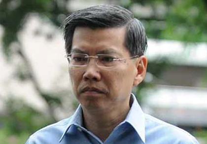 Quan chức cấp cao Singapore nhận hối lộ bằng sex ảnh 1