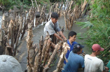 Điểm ngập mới tại khu phố 1, phường An Phú Đông. Ảnh: VĂN THUẬT