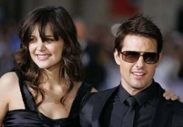 Tom và Katie có thể chia tay trong hòa bình vì Suri ảnh 1