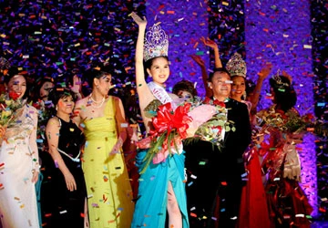 Ngọc Trinh đăng quang Hoa hậu Việt Nam Quốc tế ảnh 1