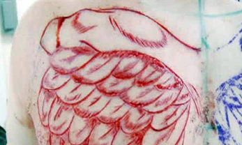 Những biến tướng ghê rợn từ hình xăm ảnh 1