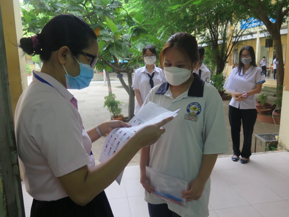 Thí sinh dự thi tốt nghiệp THPT năm 2022 tại TP.HCM. Ảnh: PA