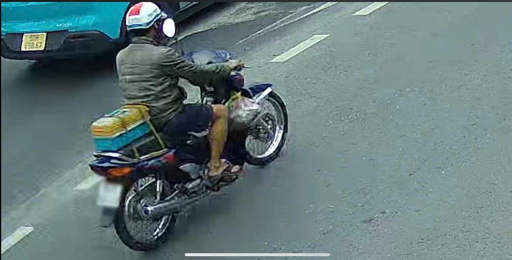 tp-hcm-da-tim-duoc-nguoi-phun-son-chu-ban-toc-do-tren-duong-le-quang-dao (2).jpg