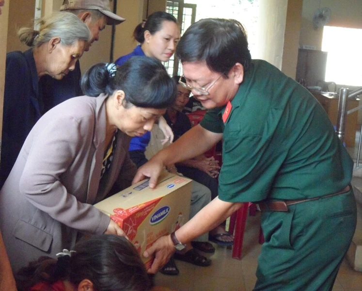 'Thêm 1 kí gạo, cân đường là chúng tôi bớt đi một nỗi lo Tết' ảnh 1