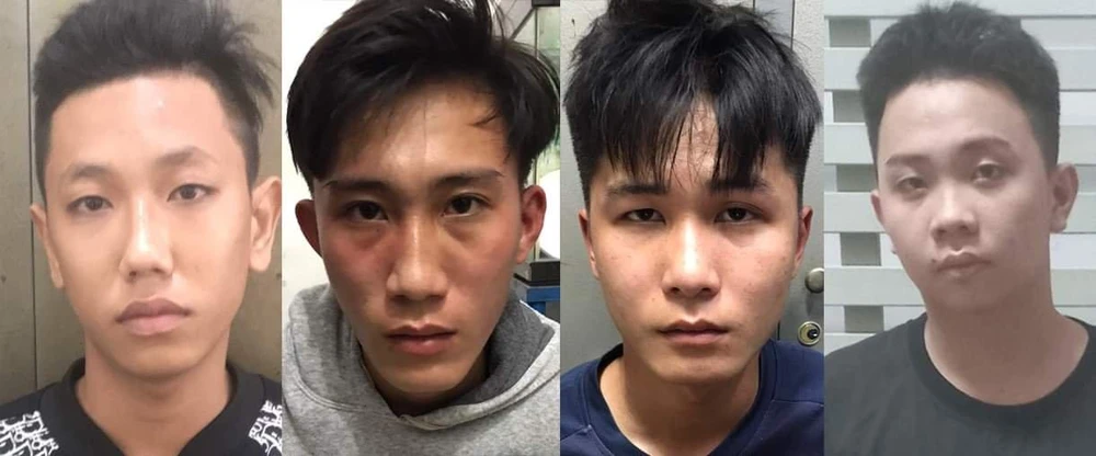 Phước, Tùng, Tú, Anh (từ trái qua) tại cơ quan điều tra. Ảnh: CA