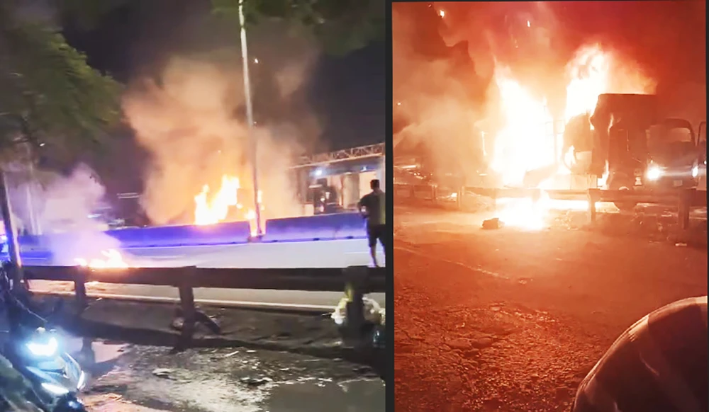 Thấy xe tải cháy, tài xế chạy khoảng 2km kêu cứu người dân