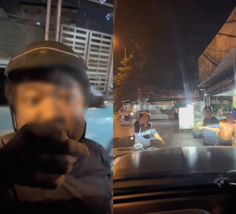 Công an làm việc với hai người đàn ông chặn ô tô, ném đá vào kính chắn gió