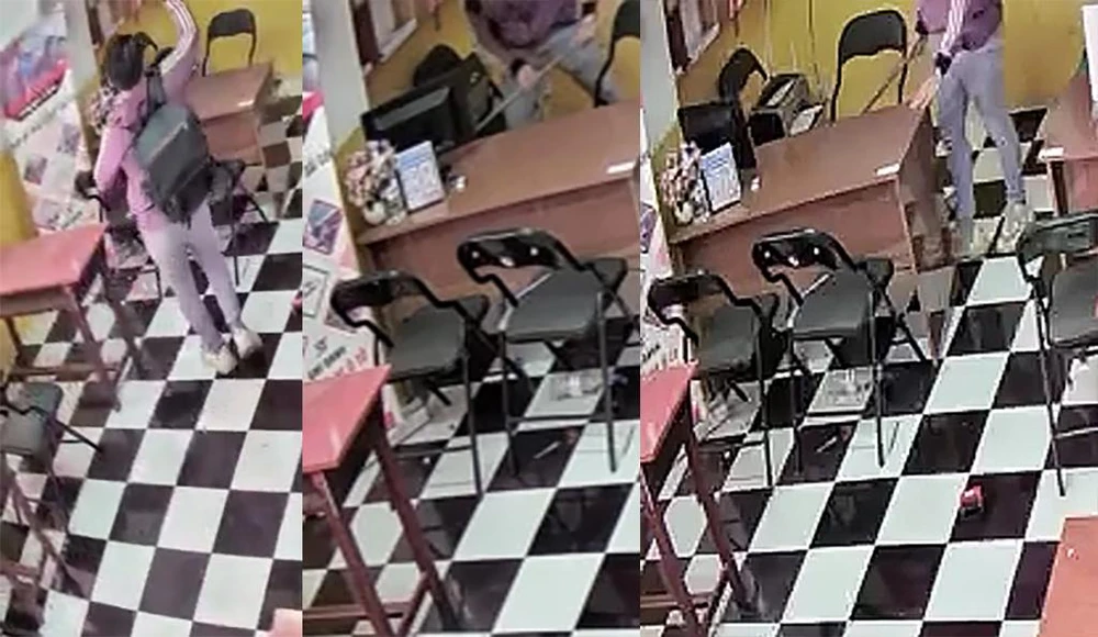 Hình ảnh Đăng đập phá máy móc bị camera ghi lại. Ảnh cắt từ clip