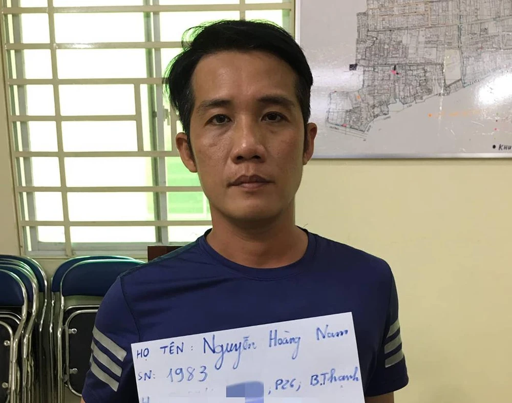 Nguyễn Hoàng Nam tại cơ quan công an. Ảnh: ĐC