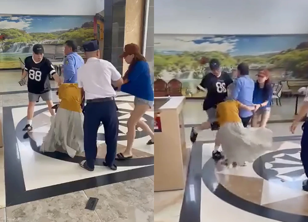 hành hung phụ nữ ở sảnh chung cư