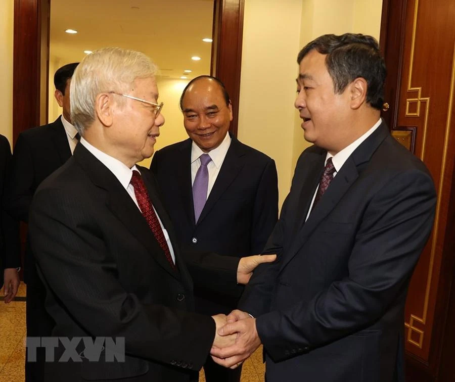 Tổng Bí thư Nguyễn Phú Trọng, Chủ tịch nước Nguyễn Xuân Phúc cùng các đại biểu dự bế mạc Hội nghị. Ảnh: TTXVN