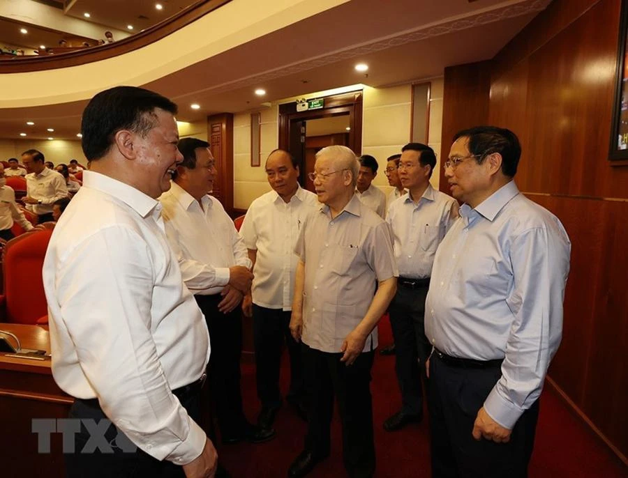 Tổng Bí thư Nguyễn Phú Trọng, Chủ tịch nước Nguyễn Xuân Phúc, Thủ tướng Phạm Minh Chính, Thường trực Ban Bí thư Võ Văn Thưởng cùng các đại biểu tham dự hội nghị. Ảnh: TTXVN