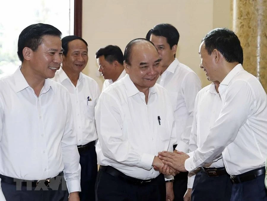 Chủ tịch nước Nguyễn Xuân Phúc cùng các đại biểu tại buổi làm việc với Ban Thường vụ Tỉnh ủy Thanh Hóa. Ảnh: TTXVN