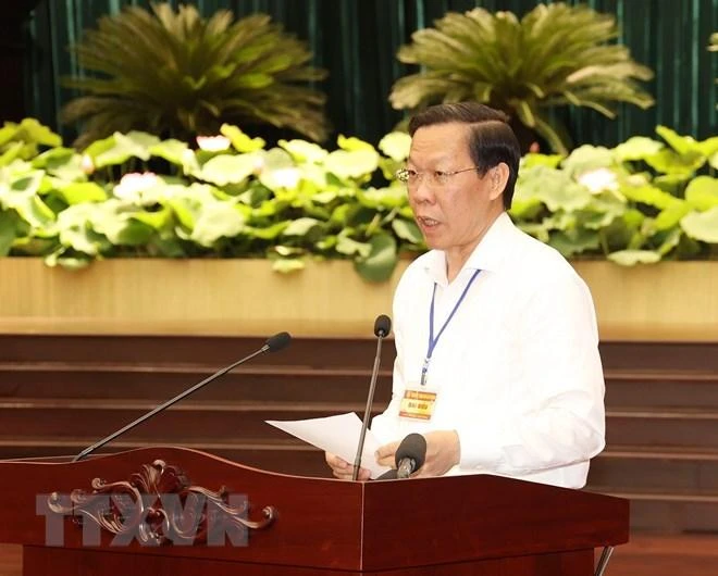 Phó Bí thư Thành ủy TP.HCM, Chủ tịch UBND TP.HCM Phan Văn Mãi báo cáo tại buổi làm việc. Ảnh: TTXVN