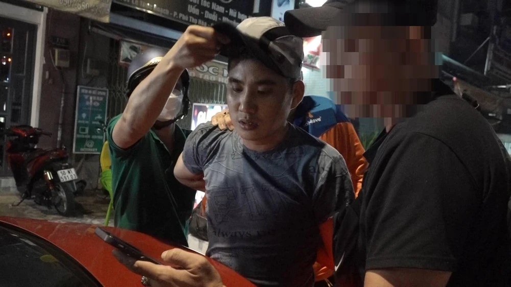 Trần Văn Hoài bị công an bắt giữ. Ảnh: HT