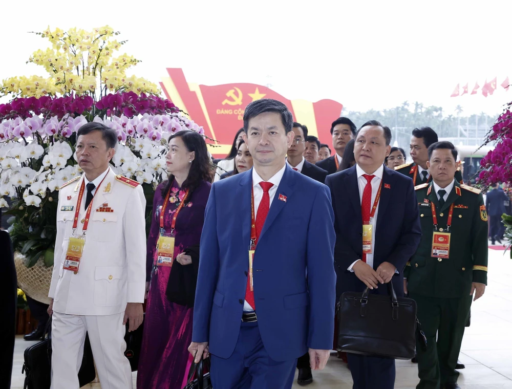 hinh-anh-lanh-dao-dang-nha-nuoc-va-cac-dai-bieu-trong-ngay-khai-mac-dai-hoi-xiv-ttxvn-3.jpg