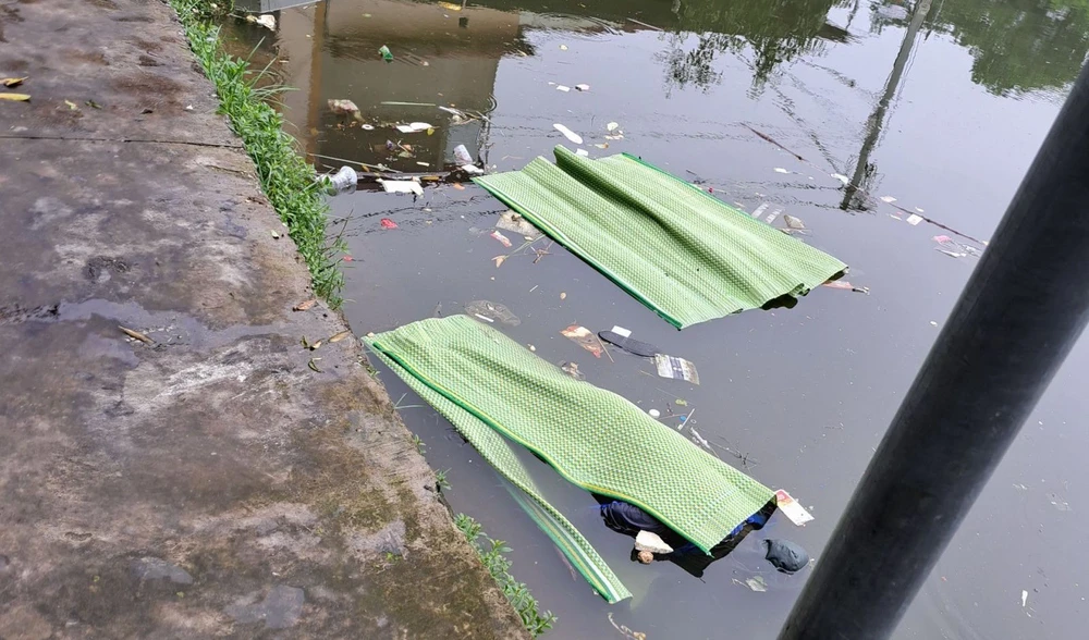 Điều tra vụ thi thể đôi nam nữ chết dưới ao ở Bắc Giang.jpeg