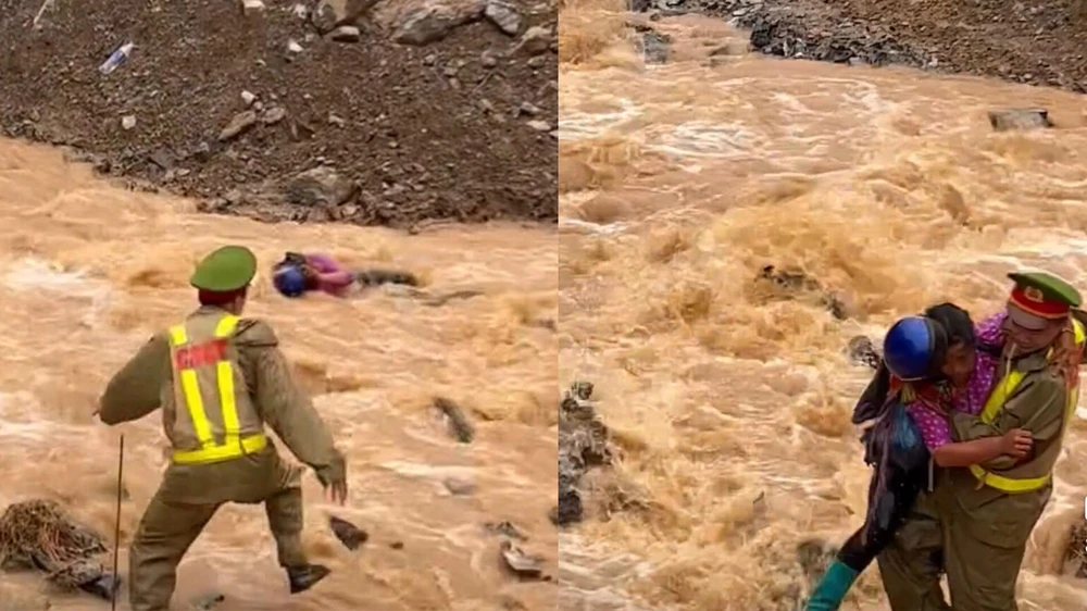 Chiến sĩ CSGT Hà Giang giải cứu cô gái giữa dòng nước lũ.jpg