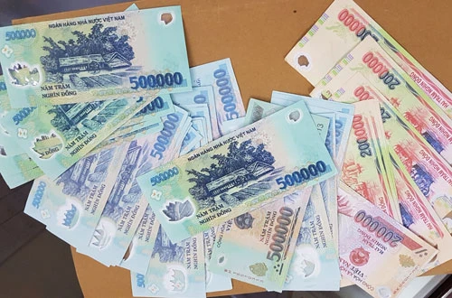 Công an tỉnh Quảng Ninh triệt phá đường dây sản xuất, lưu hành tiền giả. Ảnh minh hoạ