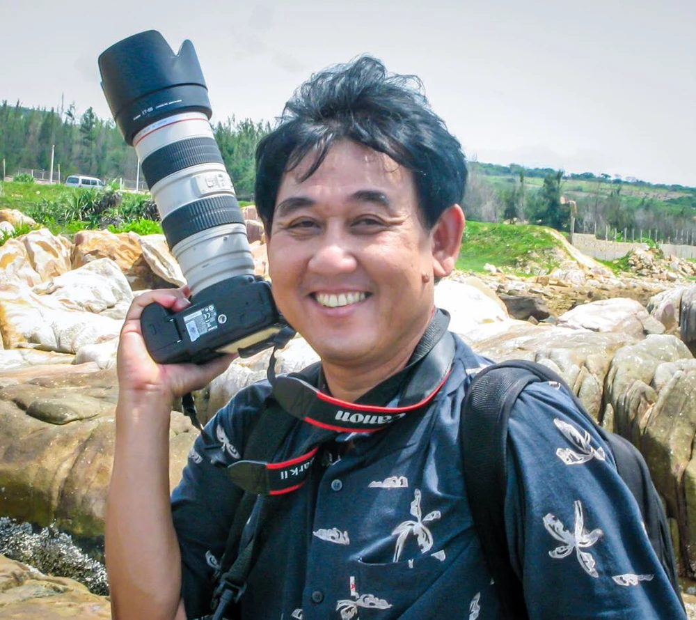 Nghệ sĩ nhiếp ảnh Hữu Thành.