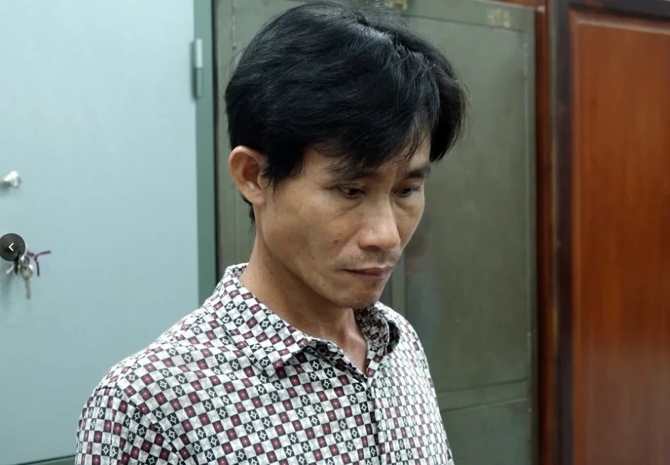 Nguyễn Văn Thuật lúc bị bắt. Ảnh NHƯ Ý.