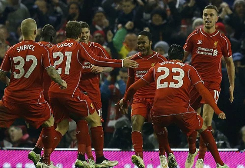 Niềm vui của các cầu thủ Liverpool khi ghi bàn gỡ hòa. Ảnh:Reuters. 1421788456504-lc-galleryImage-8934-5578-