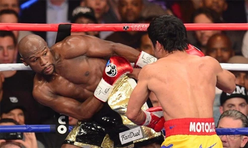 Không hấp dẫn về chuyên môn, nhưng lần thượng đài giữa Mayweather và Pacquiao hôm 3/5 lại là con ngỗng đẻ trứng vàng cho các nhà tổ chức cũng như hai võ sĩ. Ảnh:AP. nedon-8367-1430885601-8645-1431744441.jp